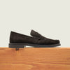 Men's dark brown Italian suede penny dress loafer with brown sole.