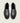 Men's black Italian leather penny loafer dress shoe with black sole.