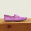 Side view of Decker suede loafer showcasing violet suede upper on wooden block against neutral background
