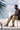 Man sitting by beach wearing Men's European suede leather gray loafers