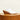 Front three-quarter view of Ava mule showcasing ivory nappa leather upper and stacked wooden heel on cream background